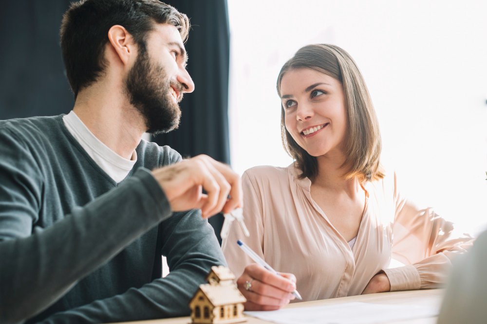 Couple in real estate agency 