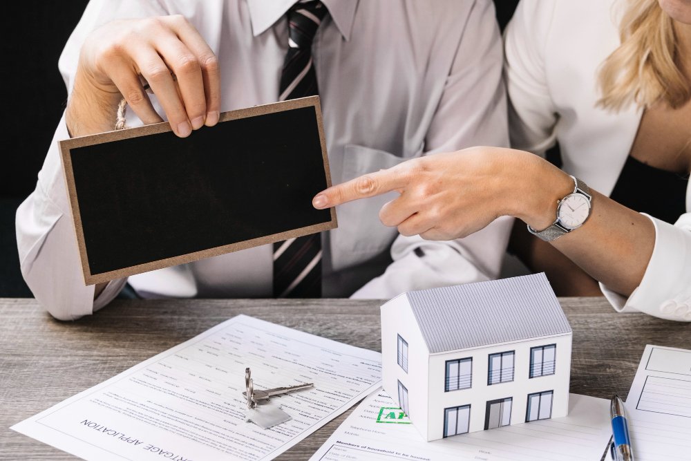Real estate agent with client on meeting 